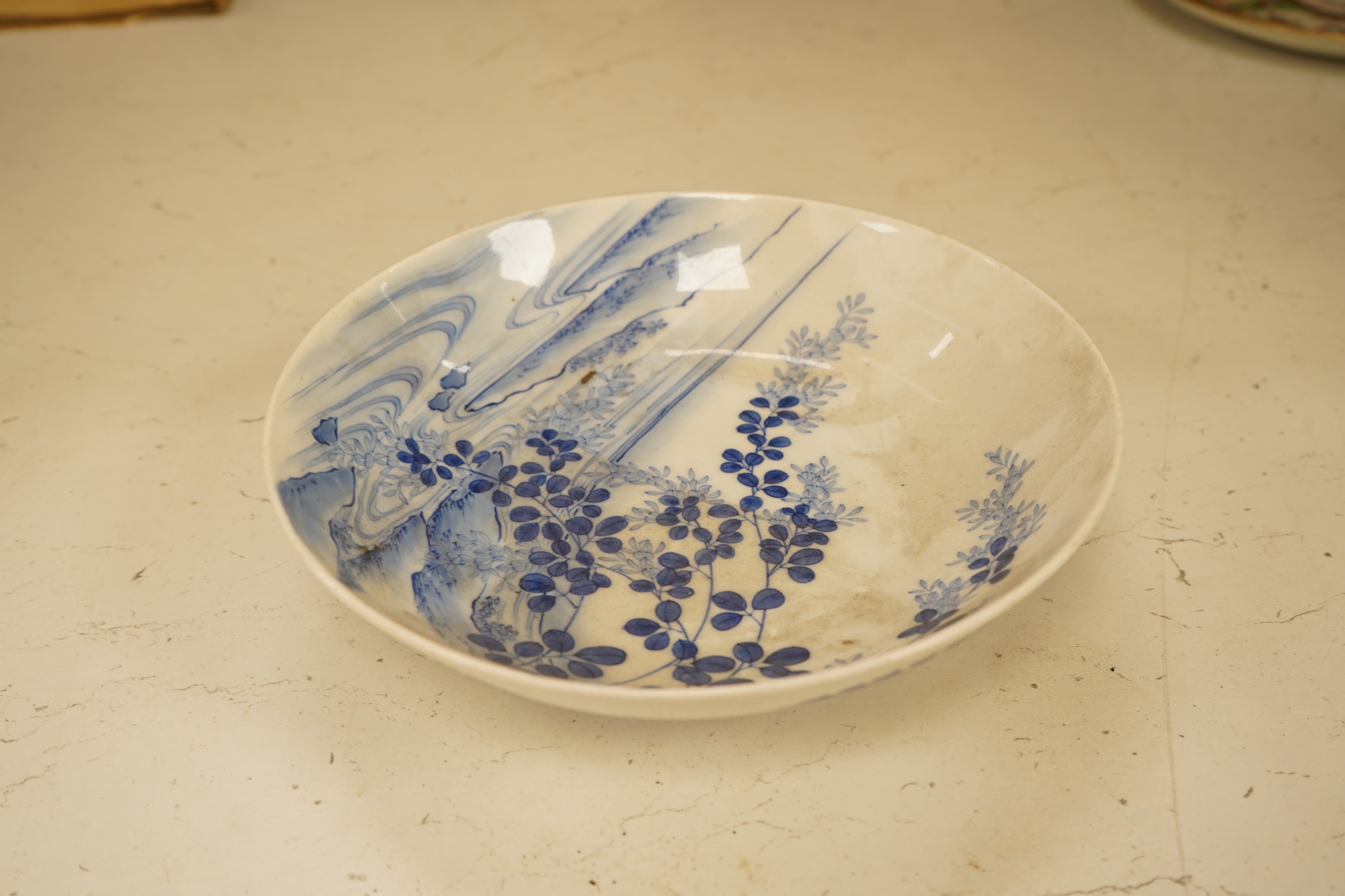 A Japanese Nabeshima style footed dish, 21cm diameter
